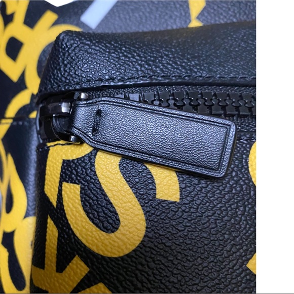 New Authentic Michael Kors Backpack Black with yellow letters Unisex - Picture 3 of 11